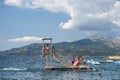 Tourist using diving platform Royalty Free Stock Photo