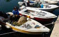 Albanian fishermen selling fish from fishing boats in Sarande