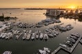 Sarasota Bay marina with luxury yachts and Florida city architecture at sunset. High-rise office buildings in downtown Royalty Free Stock Photo