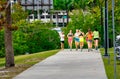 Sarasota, Florida - February 4, 2016: Group of young girls jogging along the city park Royalty Free Stock Photo