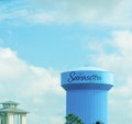 Visit Sarasota County written on a clue water tower