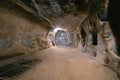 Saratli, Turkey - August 27, 2020: The interior of an ancient underground city on the territory of Cappadocia. Rooms deep