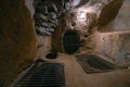 Saratli, Turkey - August 27, 2020: The interior of an ancient underground city on the territory of Cappadocia. Rooms deep