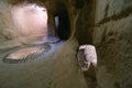 Saratli, Turkey - August 27, 2020: The interior of an ancient underground city on the territory of Cappadocia. Rooms deep