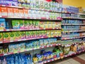 Goods on the shelf of a grocery store. Different baby food. Royalty Free Stock Photo