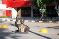 Saratov, Russia - 07.21.2019: Monument to the plumber, installation man worker climbs out of the sewer manhole