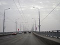 Saratov, Russia, Nov 5, 2021 - cars drive over the bridge over the Volga between the cities of Saratov and Engels