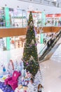 Saratov, Russia - 11/21/2020: People in the shopping center Tau gallery decorated for Christmas and New Years Christmas tree,