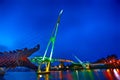 The Sarawak River cruise passes Kuching`s iconic tourism attraction, the Darul Hana Bridge and Sarawak Legislative Assembly comple Royalty Free Stock Photo