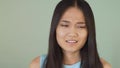 A sarcastic Asian girl annoyingly says blah blah blah and makes the same hand gesture. False information. . video blue