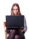 Sarcastic young woman with laptop.