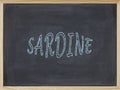 Sardine meat written on a blackboard