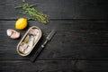 Sardines can preserve, on black wooden table background, top view flat lay, with copy space for text Royalty Free Stock Photo