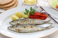 Sardinhas assadas, charcoal grilled sardines Royalty Free Stock Photo