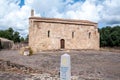 Sardinia. San Giovanni Suergiu. Palmas. Church of Santa Maria di Palmas, 11th century AD. Southern facade and trekking milestone
