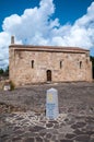 Sardinia. San Giovanni Suergiu. Palmas. Church of Santa Maria di Palmas, 11th century AD. Southern facade and trekking milestone