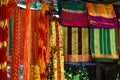 Sarees for religious offering at a temple, holy threads, headbands for sale Royalty Free Stock Photo