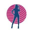 Silhouette of a cowgirl in a sexy pose. Royalty Free Stock Photo