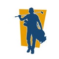 Silhouette of a golfer walking while carrying his golf bag full of golf clubs. Royalty Free Stock Photo