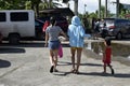 Young ladies wearing short pants walking towards beach resort premises