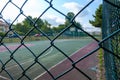 empty large football astro turf football field in Arikoy and goal net behind the fences in summer time sport entertainment concept Royalty Free Stock Photo