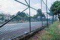 football astro turf football area in Arikoy and goal net behind the fences in summer time sport entertainment empty large sport Royalty Free Stock Photo