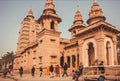 Tourists and pilgrims walking around the sacred landmark, ancient Buddhist temple Mulagandhakuti Vihara