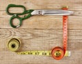 Sartorial meter and scissors Royalty Free Stock Photo