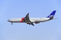 SAS Airbus A340-313X landing in Beijing