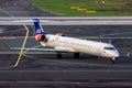 SAS Scandinavian Airlines Bombardier CRJ-900LR passenger plane arriving at Dusseldorf Airport. Germany - December 17, 2015 Royalty Free Stock Photo