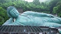 Sasaguri, Fukuoka Prefecture, Japan Bronze statue of a reclining Buddha, said to be the largest bronze statue in
