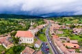 Saschiz saxon village and fortified Church in middle Transylvania, Romania, Eastern Europe. Aerial view from a drone. Royalty Free Stock Photo