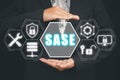 SASE, Secure Access Service Edge concept, Person hand holding Secure Access Service Edge icon on virtual screen background,