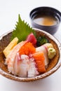 Sashimi Don Served with Seaweed, Wasabi, Prickle Ginger and Miso Soup Royalty Free Stock Photo