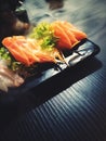Sashimi salmon raw japanese food in a restaurant