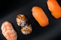 Sashimi sushi set on black plate, closeup. Royalty Free Stock Photo