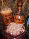 Sassafras root bark in an antique wine decanter.