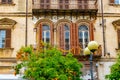 Sassari city, old houses and orange tree