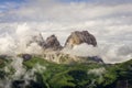 Sassolungo peaks in a cloudy landscape. Dolomites. Italy