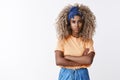 Sassy and determined, good-looking stylish african-american blond girl afro hairstyle in trendy headband, orange t-shirt
