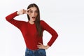 Sassy good-looking caucasian brunette female ready rock the dance floor during halloween office party, wear red sweater