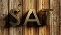 SAT brass write on raw wood - 3D rendering