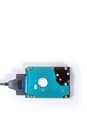 Sata cable connected to hdd 2.5 hard drive disk on white background closeup view Royalty Free Stock Photo