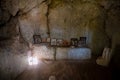 Sataniv, Ukraine - October 14, 2023: ancient Rock-cave monastery in the past a pagan temple, a place of pilgrimage. interior in