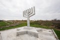 Sataniv, Ukraine - October 23, 2022: Monumet of symbol Hanukkah at Jewish cemetery
