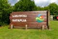 Entrance to Sataplia Nature Reserve, Kutaisi, Georgia, wooden entrance sign.