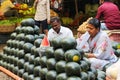 Indian woman sells fresh watermelons