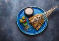 Satay ayam or malaysian meat skewers with peanut saucem copyspace