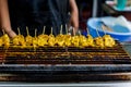 Satay chicken on grill. Asian Food : satay or yakitori chicken stand at street food Royalty Free Stock Photo