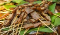 Satay sate skin cow with brown color and banana leaf to serve traditional food